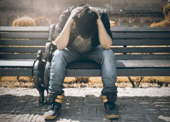 Think on these things on simple 7 points, avoid regret | man in black shirt and gray denim pants sitting on gray padded bench