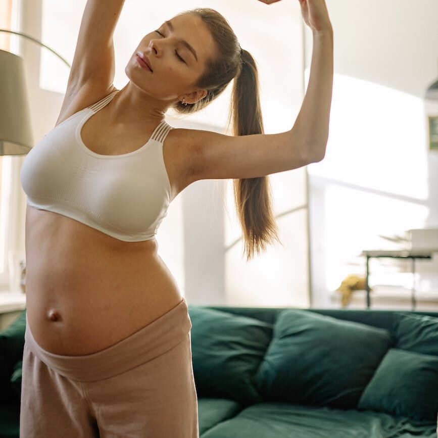 pregnant woman doing home workout