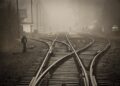 railroad tracks in city | Poem: To The Next Station