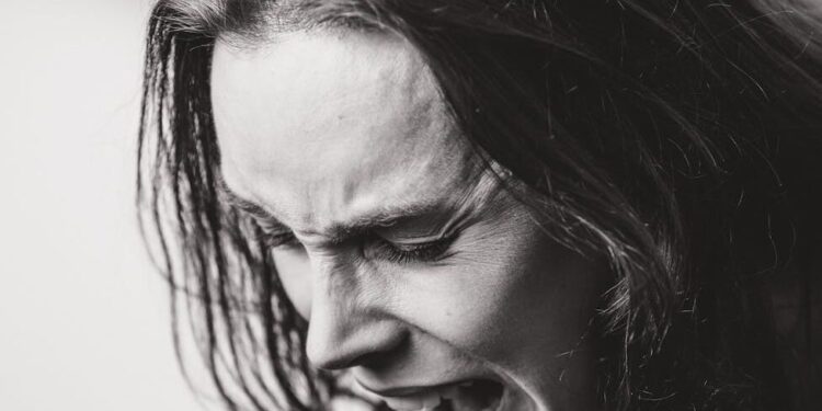 pexels-photo-31869032 ANA Times dramatic black and white emotional expression portrait: This essay explores effective anger management techniques and the rising impact of digital disorders. It discusses causes, symptoms, and evidence-based strategies for emotional regulation, along with practical solutions for overcoming smartphone and internet addiction to promote mental well-being.