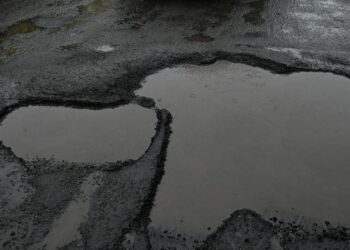 Pothole-riddled roads continue to plague commuters in Kochi city