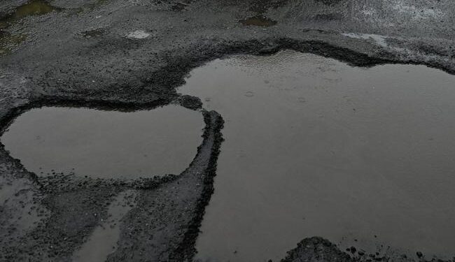 Pothole-riddled roads continue to plague commuters in Kochi city
