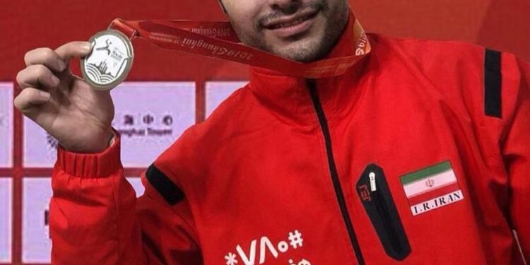 Farshid Asadian clinched gold at the Shanghai World Wushu Championships despite a severe knee injury, helping Iran achieve a historic clean sweep with 8 gold medals in 8 Sanda weight categories—a true masterpiece in global wushu.