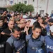 Mourners carry the body of Palestinian journalist Hassan Eslaiah, who was killed in an Israeli strike on Nasser Hospital, with the Israeli military saying he was targeted for being a Hamas terrorist involved in the October 7, 2023, onslaught in southern Israel that sparked the war, in Khan Younis, southern Gaza Strip, May 13, 2025. (AP Photo/Jehad Alshrafi)